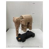 Wooden reticulated elephant on wheeled cart
