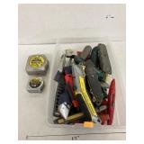 Tape measurers and utility knives