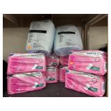 8 packs of Molicare Premium & 2 Paxks Underpads