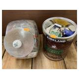 Canister and can full of matchbooks