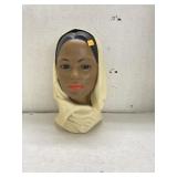Female head figurine