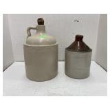 2- crock jugs (one handle broken)