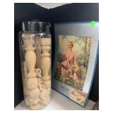 Container of Wooden Pieces and Advertising