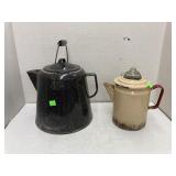 Enameled coffee pots (pin holes in smaller one)