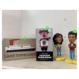 Bobble heads and painted Wood