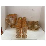 Carnival glass pitcher, 10 glasses, plate,