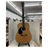 Guitar, Stand, and left handed guitar buddy,