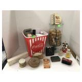 Glass vase of corks and bucket of Antique items