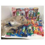 2 Bags of apex Candy Dispensers, Most Unopened