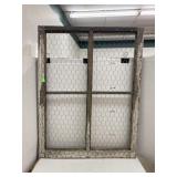 Chicken wire on window frame