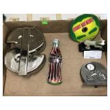 Flat of items, Astro Clock, Coca Cola Tin
