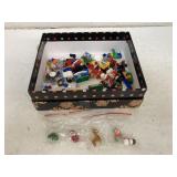 Box of Lego pieces and mini glass xmas figures