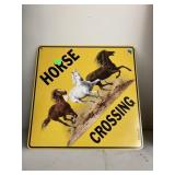 Metal horse crossing sign