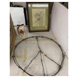 Barb wire peace sign, bird picture and candle