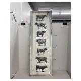 Metal cow wall sign