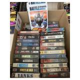 Box of VHS And Game
