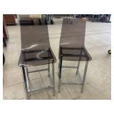 clear acrylic and chrome counter stool with a