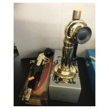 2 Avon Bottles with boxes, Gun and Phone