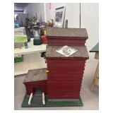 wooden grain elevator model for a model train