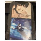 Binder of CDs, approximately 25