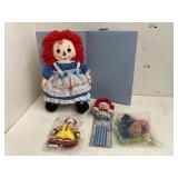 Raggedy Ann doll, bookmark, &Happy Meal toys