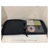 Binder of CDs, approximately 25