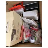 Box of party supplies, foot massager, misc -