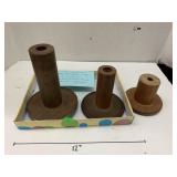 3 wooden bobbins