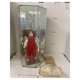 Doll in Glass showcase, Courtney Boots Tyner