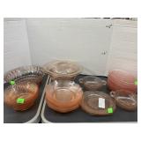Pink glass bowls & saucers