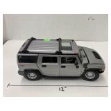 Die cast Hummer (wheel zip tied on)