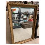 Gold-framed mirror