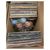Box of vinyl records, AC/DC, Bee Gees, Neil