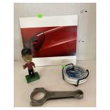 Tiger Woods bobble head, coasters, T-Bird book,