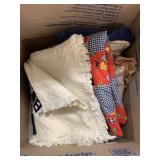 Box of Throw Blankets and Pillows