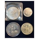 4 assorted tokens & trade dollars.