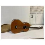 4 string acoustic guitar.