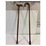 2 vintage wooden canes.