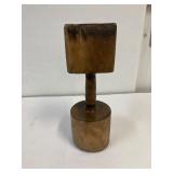 Antique wood hand stomper.