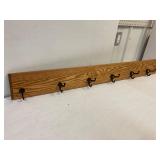 Coat rack. 6 hooks. 48' long