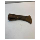 Primitive axe head.  Looks hand forged