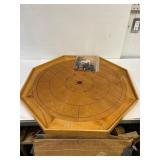 Crokinole board with the shooters.
