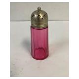 Cranberry glass sugar shaker.