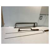 Antique meat saws and a wiener stick