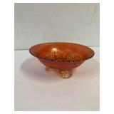 Marigold Carnival glass spatula 3 footed bowl.
