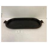 Cast iron griddle. 23 x 11.5'.  4 stamped on back