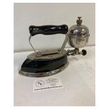 Black Coleman gas iron. Model 4-A