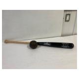 Antique ball and a Cooper baseball bat