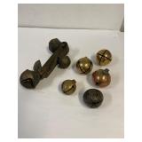 Sleigh bells. 7 good. 1 broken