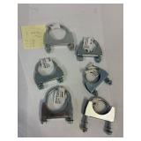 7 Muffler clamps, 1 7/8, 2 1/2, 2 1/4'